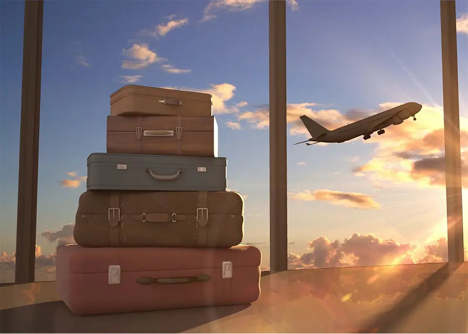 A pile of luggage sitting on top of each other.