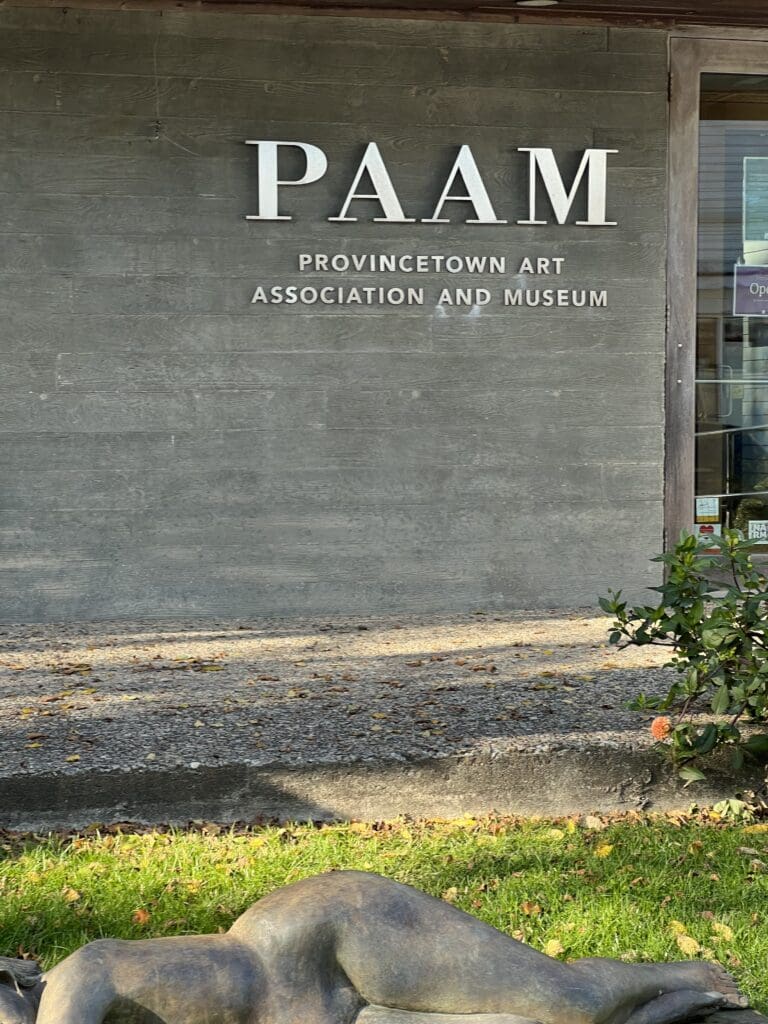 A building with the name of paam on it.