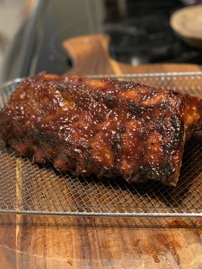 A close up of a piece of meat on a grill